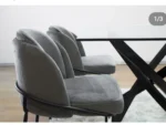 Silla color gris con patas negras